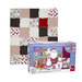 A quilting kit featuring a colorful patchwork design and a box labeled The Santa Quilt Kit.