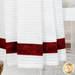 A close up on the bottom of the towel, showing details on the fabric stripe.