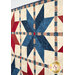 A stylized close up on the quilt, demonstrating details on the patchwork.