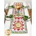 A lifestyle shot of the Double Geese Table Runner, staged on a white kitchen table with coordinating table settings at each chair.