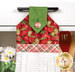 A close up on the top of the towel, showing print details on the top, loop, and fabric button.