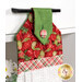 A close up on the top of the towel, showing print details on the top, loop, and fabric button.
