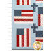 A close up on the lower left corner of the quilt, demonstrating details on the fabric prints and colors.