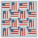 The completed God and Country Quilt featuring alternating red, white, and blue fabrics from the Independence Day collection from Moda Fabrics, isolated on a white background. 