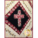 A quilt featuring a black diamond shape in the center with a floral cross design, surrounded by a red and cream checkerboard border. The background has a light gold color with floral vine motifs. The quilt is framed by a red border with a logo in the corner.