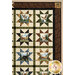 A close up on the upper right corner of the quilt, showing more details on the patchwork and borders.