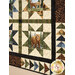A super close up on the patchwork and panel stars, featuring majestic scene with a bear and deer.