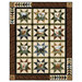 The completed Northwoods Lodge Quilt, featuring rows of patchwork stars paired with panels colored in earthy neutral fabrics, isolated on a white background. 