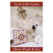 Front cover of the pattern featuring the completed design made into a pillow, staged with chicken and sheep décor.