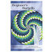 The front of the Beginner's Bargello pattern, showcasing a mesmerizing spiral bargello design in green, blue, teal, and white on a blue background. 