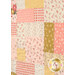 A close up on the patchwork of the quilt, demonstrating fabric color and print details as well as top quilting effects.
