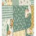 A close up on the patchwork of the quilt, demonstrating fabric color and print details as well as top quilting effects.