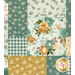 A close up on the patchwork of the quilt, demonstrating fabric color and print details as well as top quilting effects.