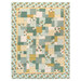 The completed Easy as ABC and 123 Quilt Kit colored in teal, cream, and ocher fabrics from the Renew collection by Riley Blake Designs, isolated on a white background. 