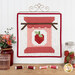 The completed A Year in Spools - June - Sew Jammy Kit, colored in white, red, and pink fabrics, staged on a display hanger with coordinating décor.