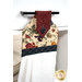 A close up shot of the top of the hanging towel, showing details on the button closure.