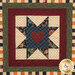 A close up shot of the center of the sawtooth star design featuring a smaller sawtooth star. 