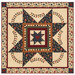 The completed Prairie Star Quilt Kit finished in primitive fabrics from the Quail Run collection by Moda fabrics, isolated on a white background. 