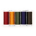 Colorful appliqué thread set of 5 spools, isolated on a white background. 