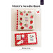 Front cover of the pattern showing the completed project in a red and pink strawberry theme, showing both the open and closed versions.