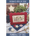 A patriotic cross stitch pattern featuring birds and stars, surrounded by decorative items.