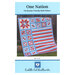Front of the pattern featuring the completed quilt in vibrant red, white, and blue fabrics.