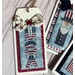 A close up on the stitched USA design, surrounded by red and blue elements and a bow.