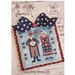 Front cover of the pattern showing Mr. and Mrs. America, a man and woman in patriotic outfits, with a bow.