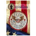 Cover of 250th Celebration pattern featuring a the finished cross-stitch design staged on an old american flag.
