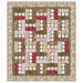 The City Lights quilt colored in pink, green, and brown floral fabrics.