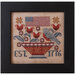 Framed cross stitch project featuring a basket of flowers, a bluebird, an American flag, and EST. 1766.