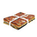 A stack of Spooky fabrics tied with ribbon, isolated on a white background. 