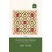 Design for a quilt titled Home for the Holidays, featuring cheerful holiday elements like red houses and green trees.