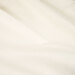Close-up of the textured, soft, white 80/20 Cotton/Poly batting.