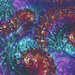 8x8 swatch of the fabric featuring a swirling shell motif with circles and dots in aqua, purple, magenta, and copper hues.