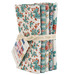 A bundle of Village Life fabric from Tilda isolated on a white background. 