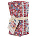 A bundle of Village Life fabric from Tilda isolated on a white background. 
