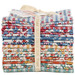 A bundle of Village Life fabric from Tilda isolated on a white background. 