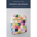 A colorful quilted backpack pattern titled Phoenix Backpack displayed against a light background.