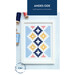 Framed cross-stitch design featuring geometric patterns in blue, yellow, pink, and navy.