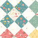 Cream cheater fabric with sage, teal, pink, and yellow floral blocks in a biased checker design.