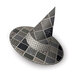 Abstract black-and-white patterned ceramic sculpture on a white background