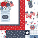 Closeup of the cheater fabric with red, white, and blue fabrics with stars, stripes, and other patriotic motifs.