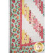A closer look at the patchwork of the quilt, showing fabric and layout details.