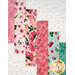 A super close up on the patchwork of the quilt, demonstrating fabric colors and print details.