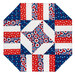 The completed Easy Patriotic Table Topper colored in patriotic themed fabrics from the Celebrate The USA collection by Benartex, isolated on a white background. 