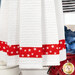 A close up on the bottom of the towel, showing details on the fabric stripe.
