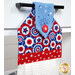 A close up shot of the top of the hanging towel, showing details on the patriotic fabrics.