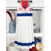 The completed Hanging Towel Kit colored in red, white, and blue fabrics from the Celebrate The USA collection from Benartex, hung on a drawer surrounded by coordinating patriotic décor. 
