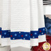 A close up on the bottom of the towel, showing details on the fabric stripe.